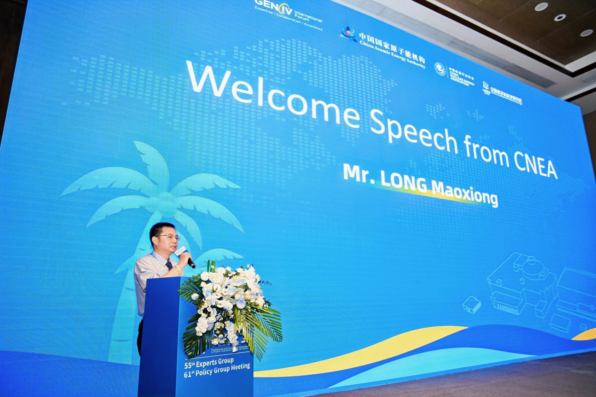Welcome address at podium in Sanya China