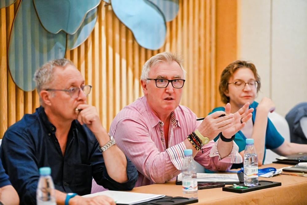 Chair moderating discussion during meeting